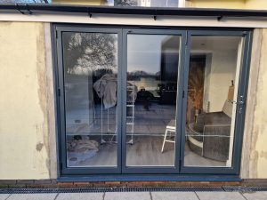 image of a set of grey bifold doors