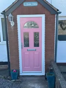 image of a pink composite entrance door