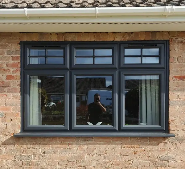 image of a house with newly fitted grey framed windows