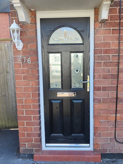image of a new black front house door