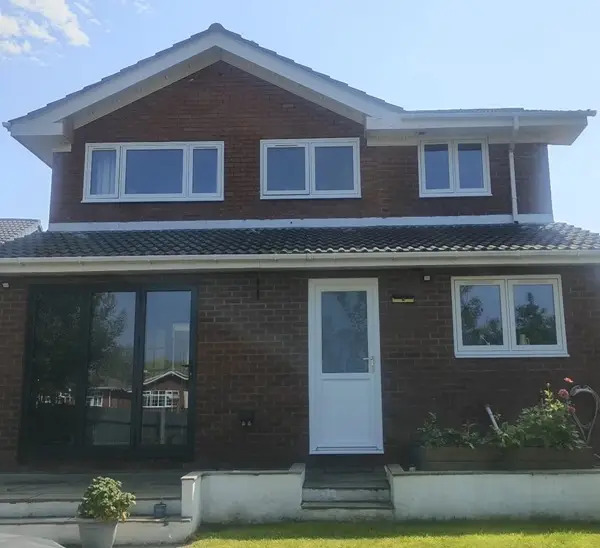 image of a house with white window frames